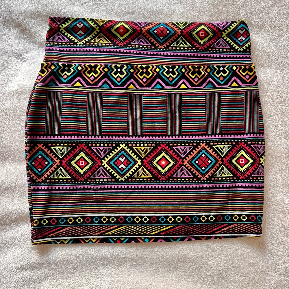 Size L/XL stretchy mini skirt. Rue21 tribal print